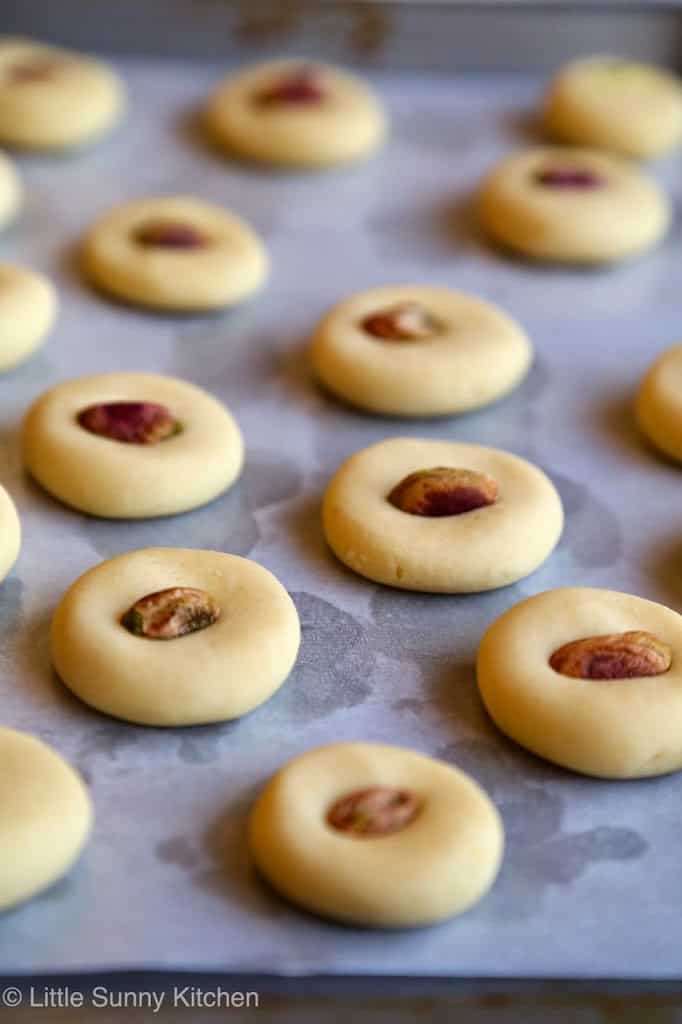 Ghraybeh cookies on a sheet pan before baking