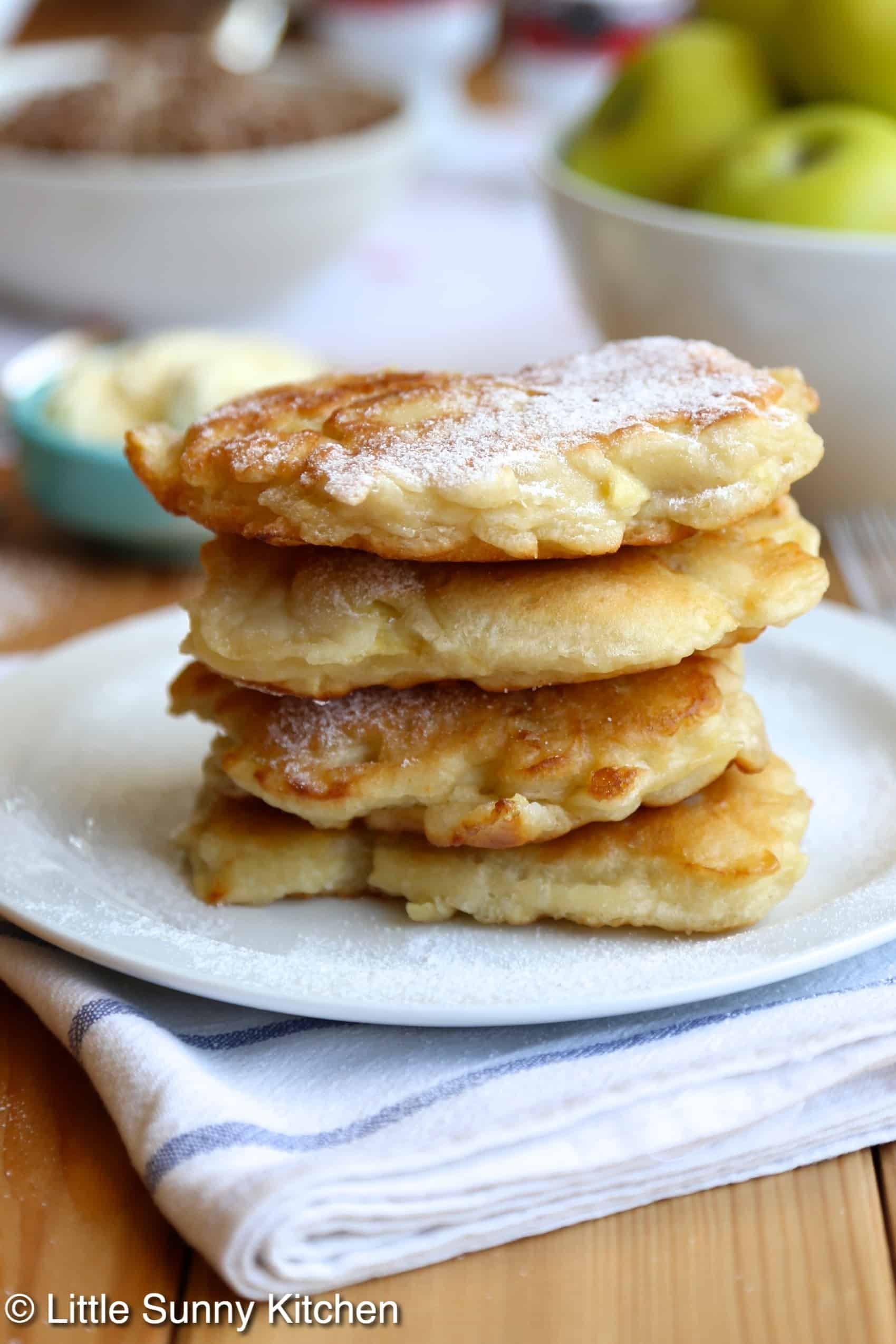 Polish apple pancakes made of apples dipped into pancake batter, then fried in butter and topped with powdered sugar or a sweet syrup of your choice!