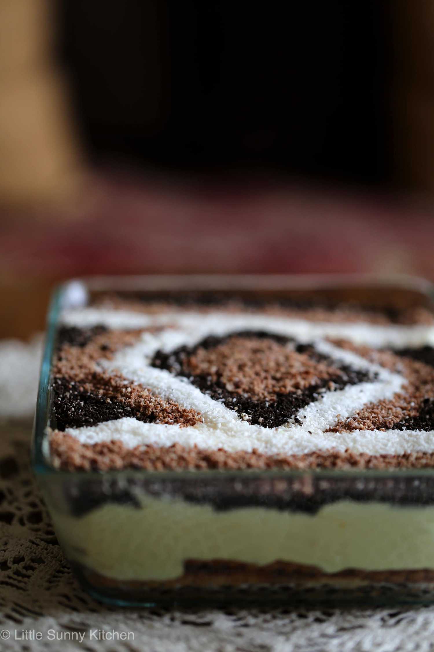 No-bake layered dessert in a 9x13 inch glass pan