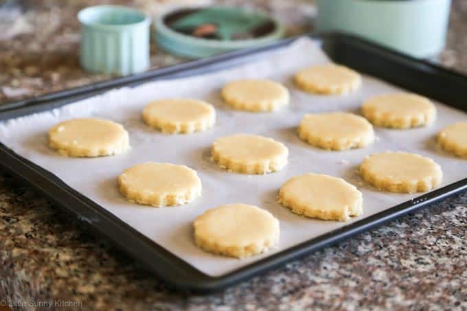 Soft coconut shortbread cookies baked with a hint of lemon and toasted coconut!