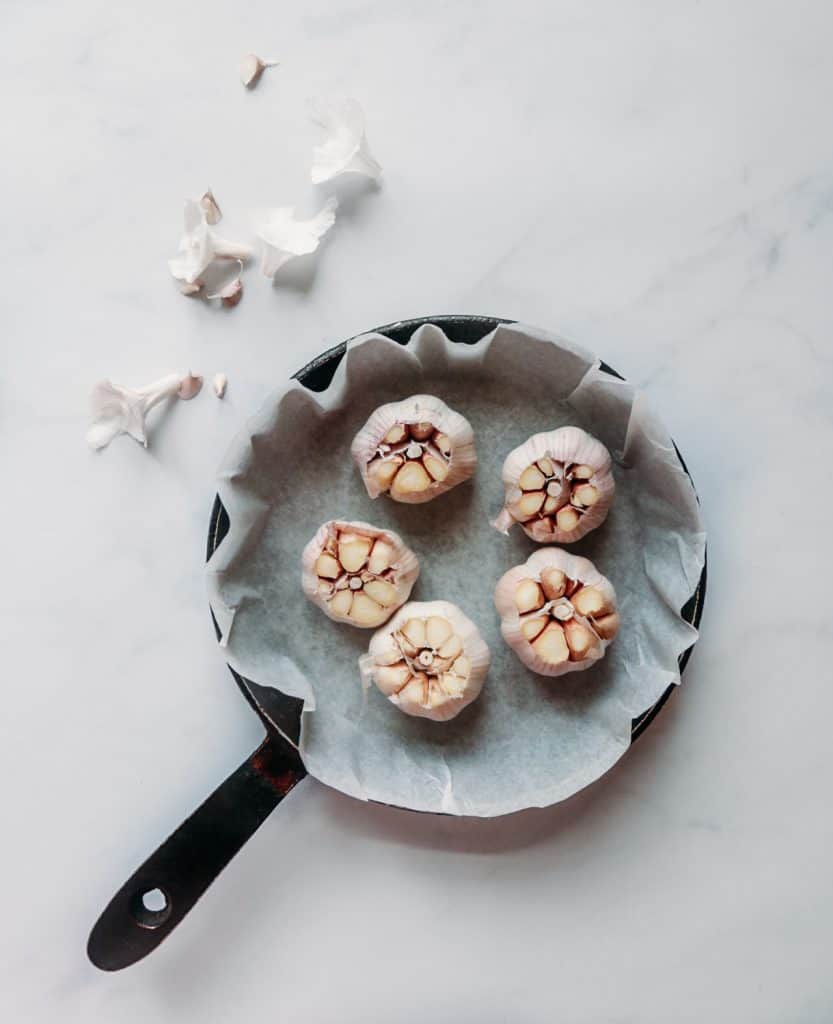 roasting garlic cloves to make roasted garlic soup