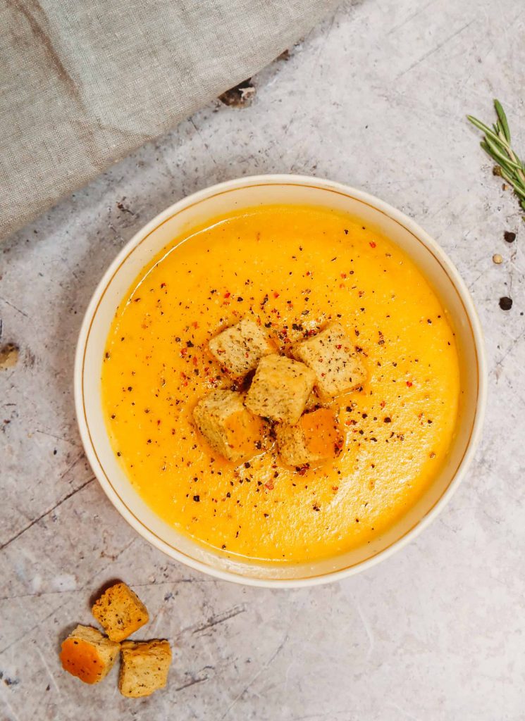 Creamy roasted sweet potato soup with carrots that can be ready in under 40 minutes!