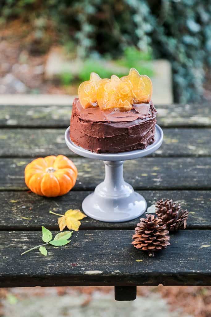 Vegan chocolate cake recipe. This cake is decorated with homemade pumpkin shaped candy