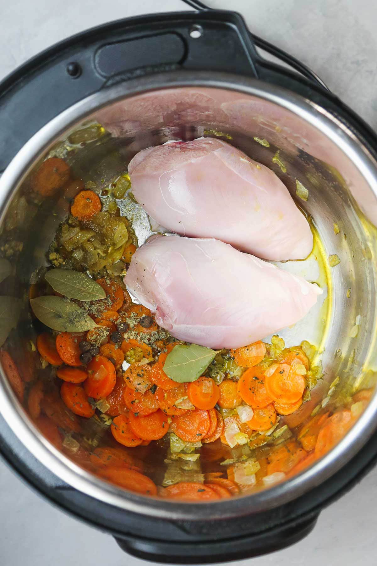 An Instant Pot with the ingredients being cooked