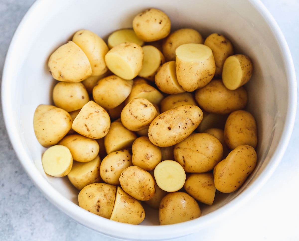 Baby new potatoes in a white bowl