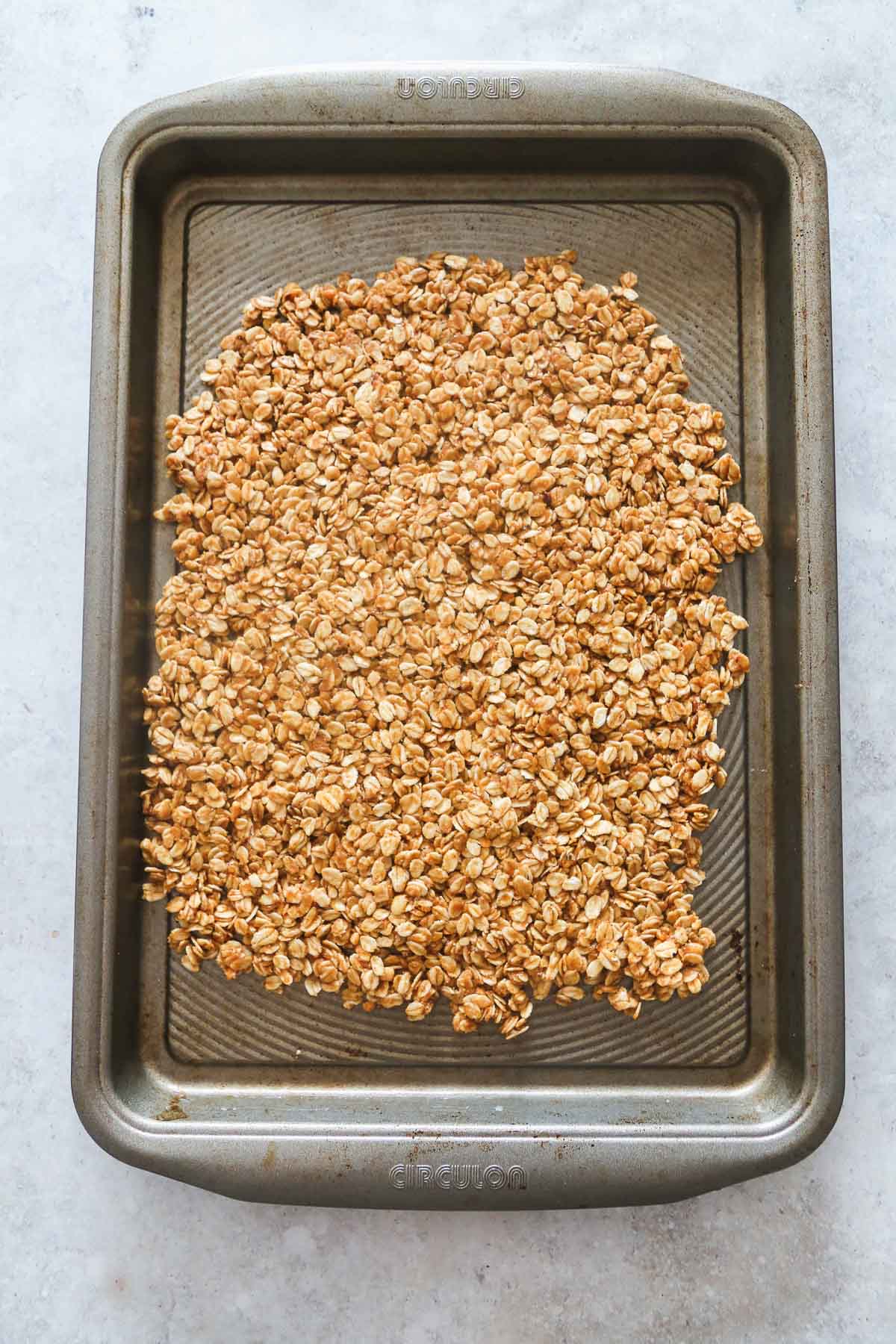 baking the granola on a baking tray