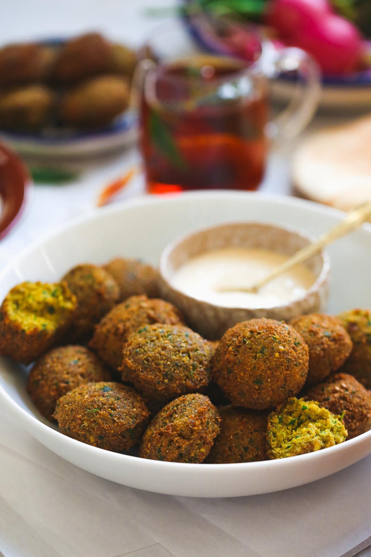 traditional falafel balls with a bite shot