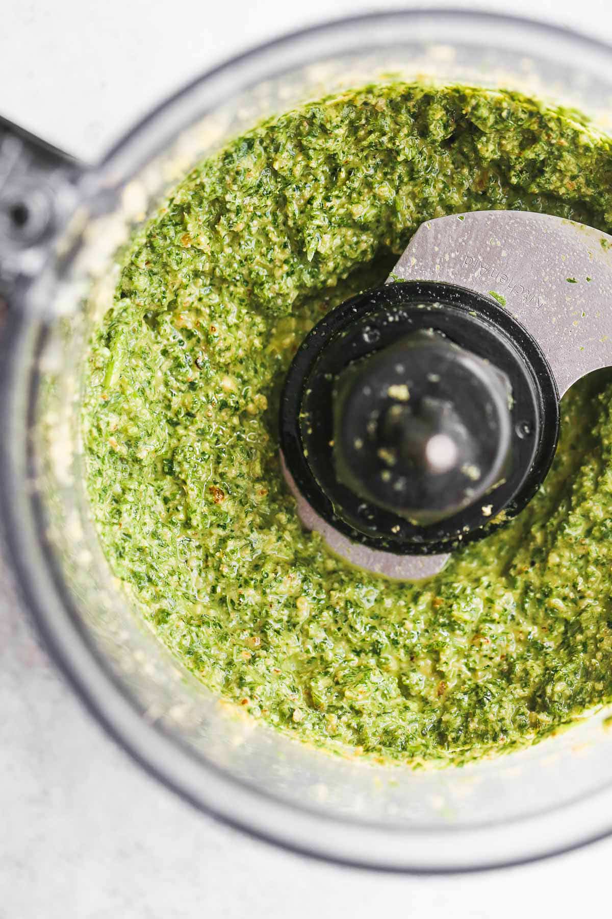 Carrot top pesto in a food processor