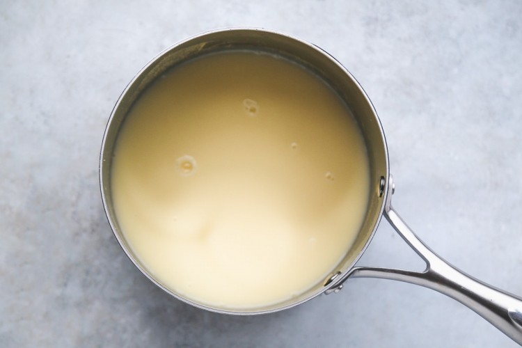 creamy cornmeal porridge in a saucepan