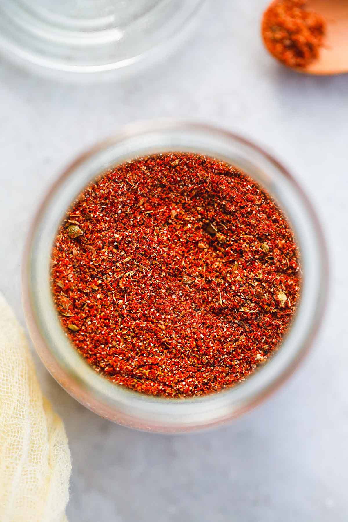 A close up shot of fajita seasoning in a Weck jar, top view.