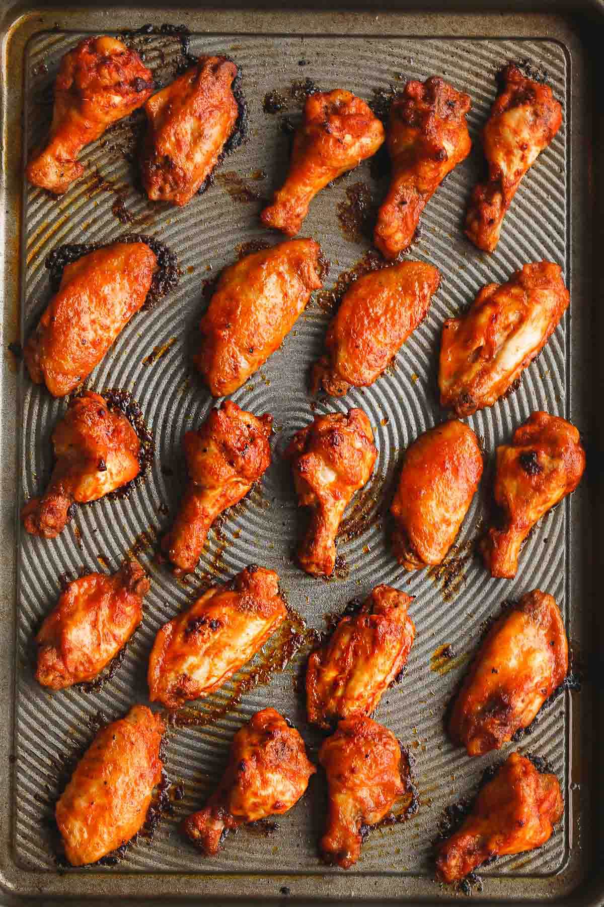 Crispy and perfectly cooked chicken wings on a sheet pan