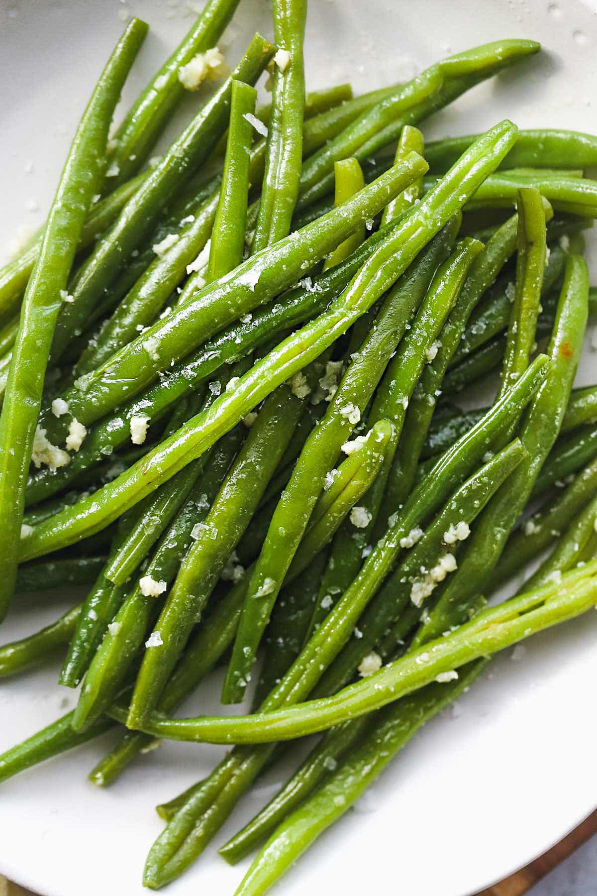 A close up shot of the garlic green beans