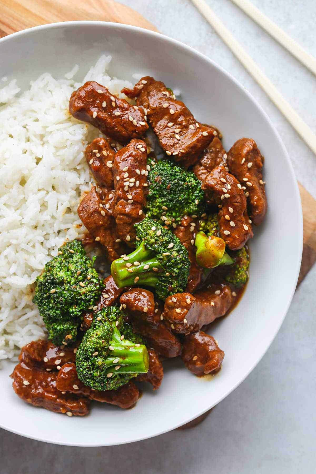 Instant Pot Beef and Broccoli in a white bowl, a close up shot