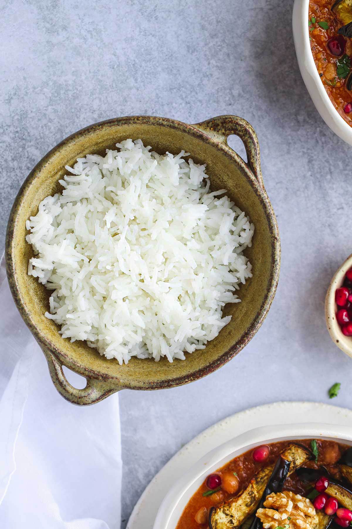 Overhead shot of perfectly cooked basmati rice in a small bowl