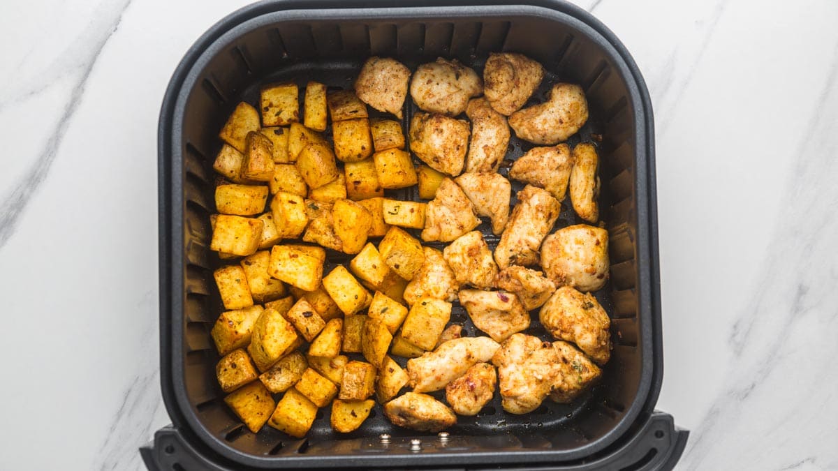 Air Fryer Chicken and Potatoes cooked in the air fryer