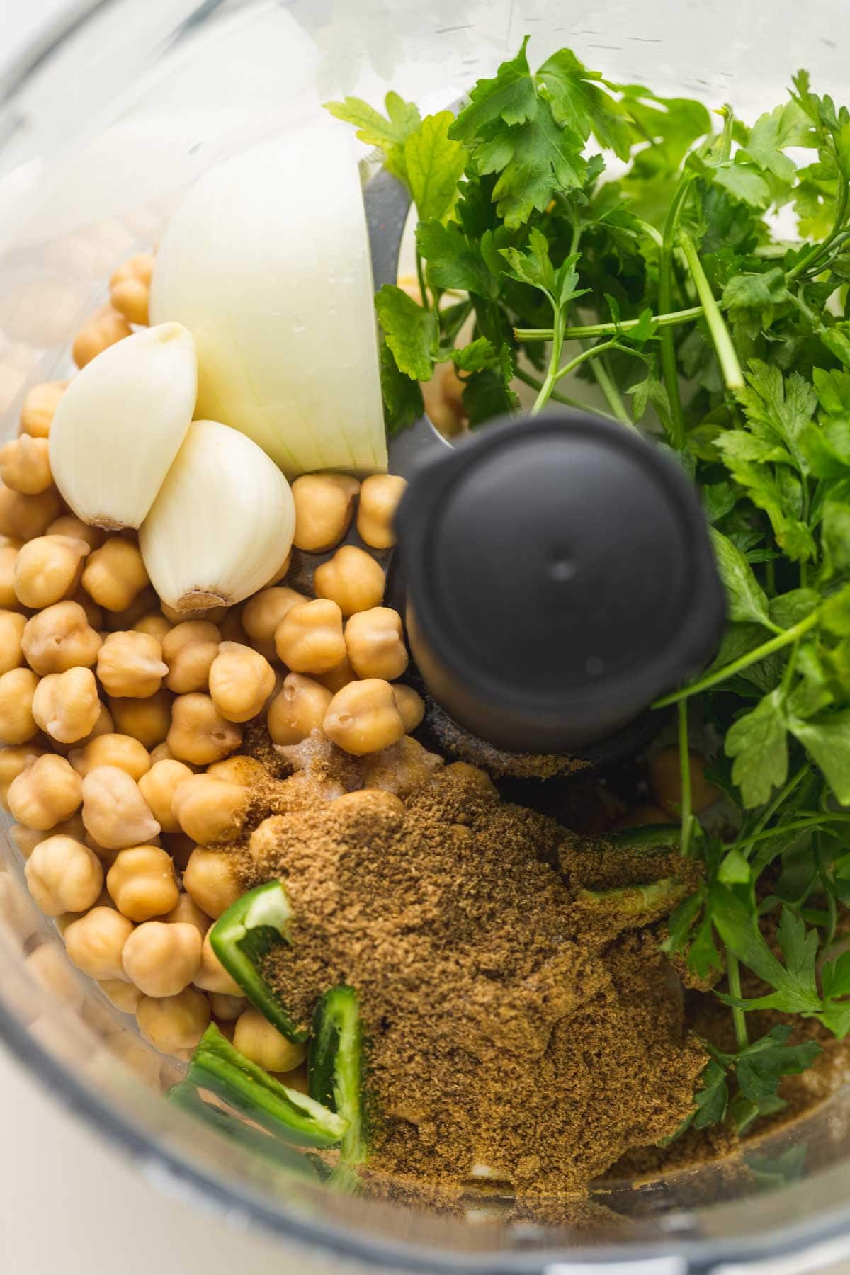 Falafel ingredients in a food processor