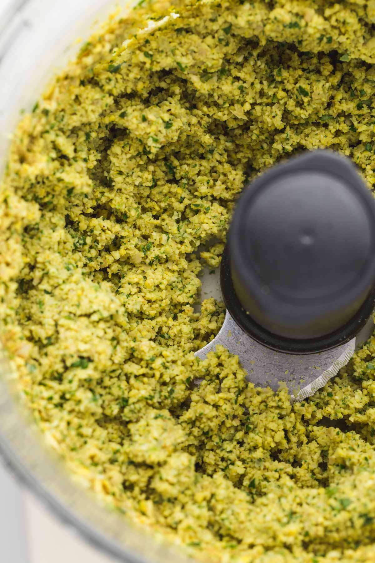 Falafel mixture in a food processor - close up 