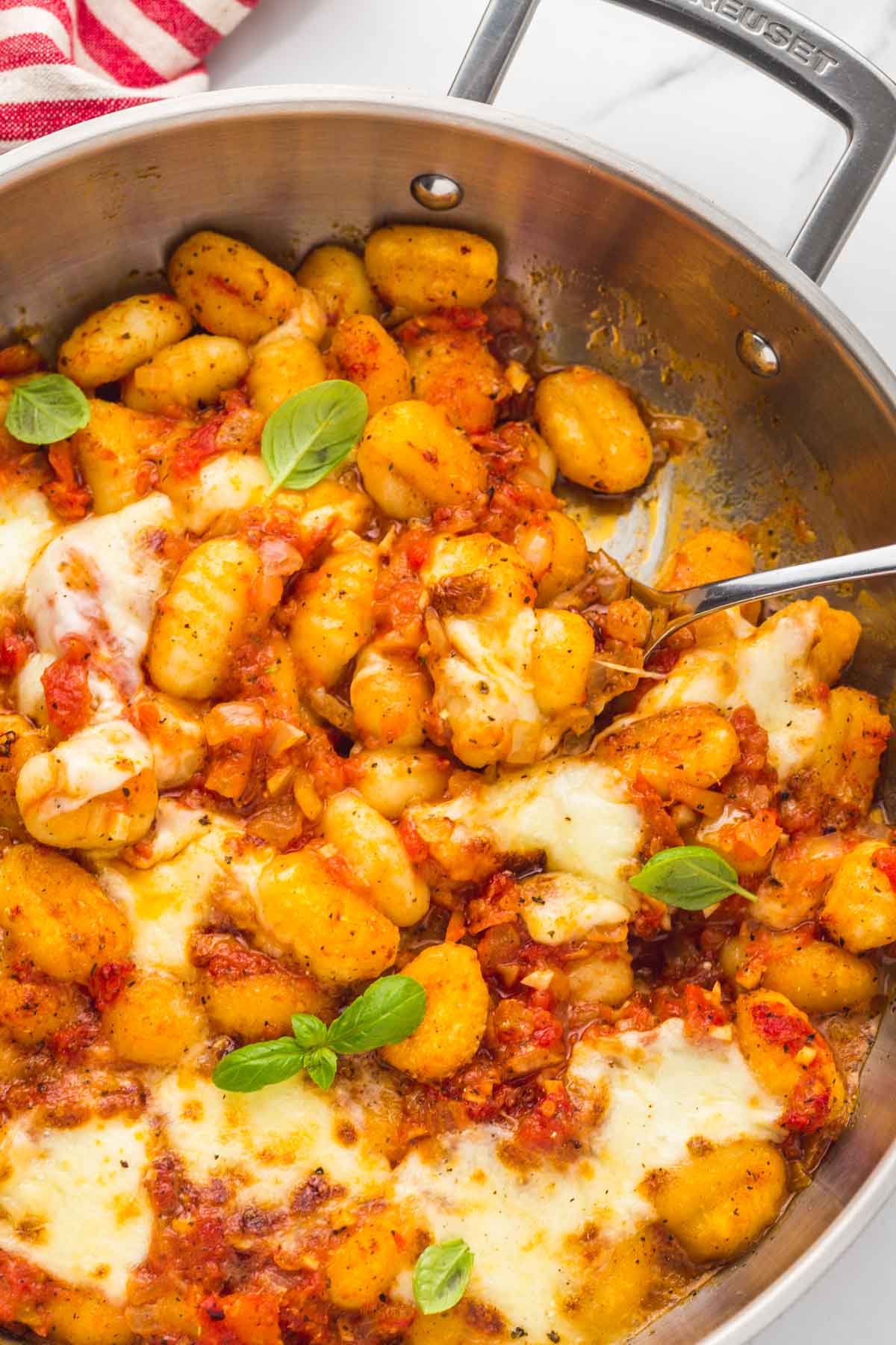 The final dish, gnocchi with al pomodoro sauce in a large skillet