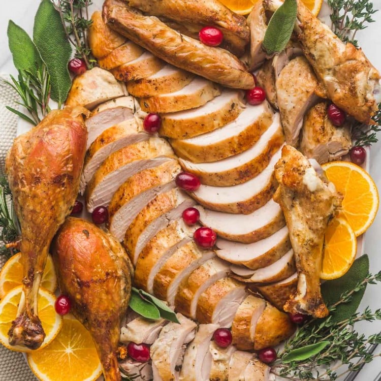 Carved and sliced turkey served on a large platter