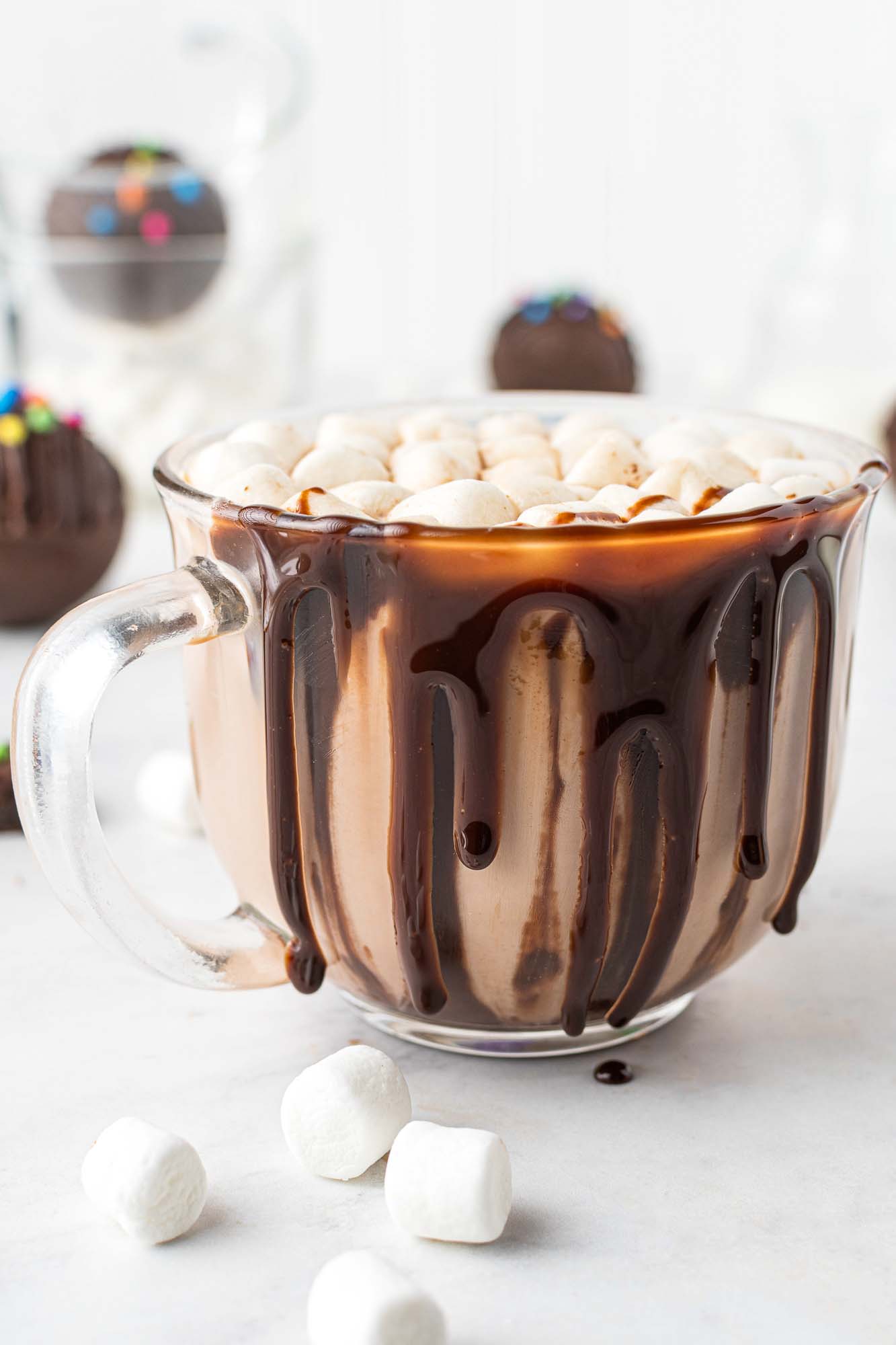 A mug of hot chocolate with chocolate syrup