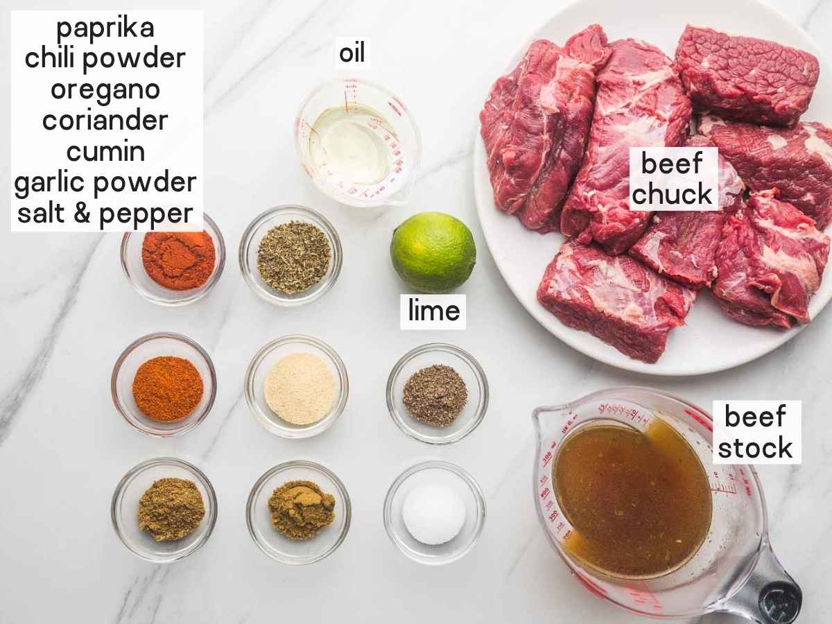 Ingredients needed to make Mexican shredded beef and tacos