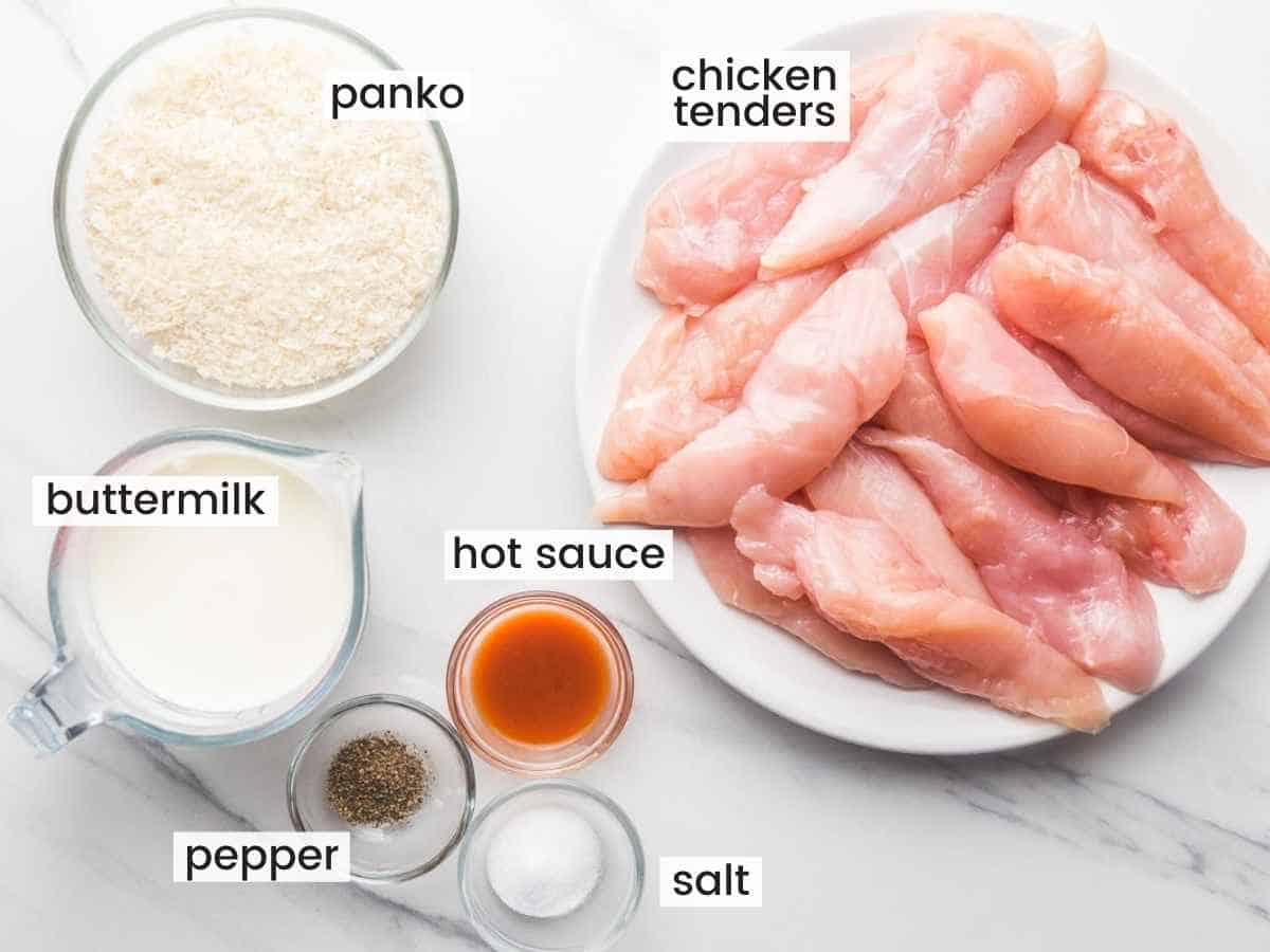 Ingredients needed for Air Fryer Nashville Hot Chicken including chicken tenders, panko, buttermilk, hot sauce, salt and pepper.