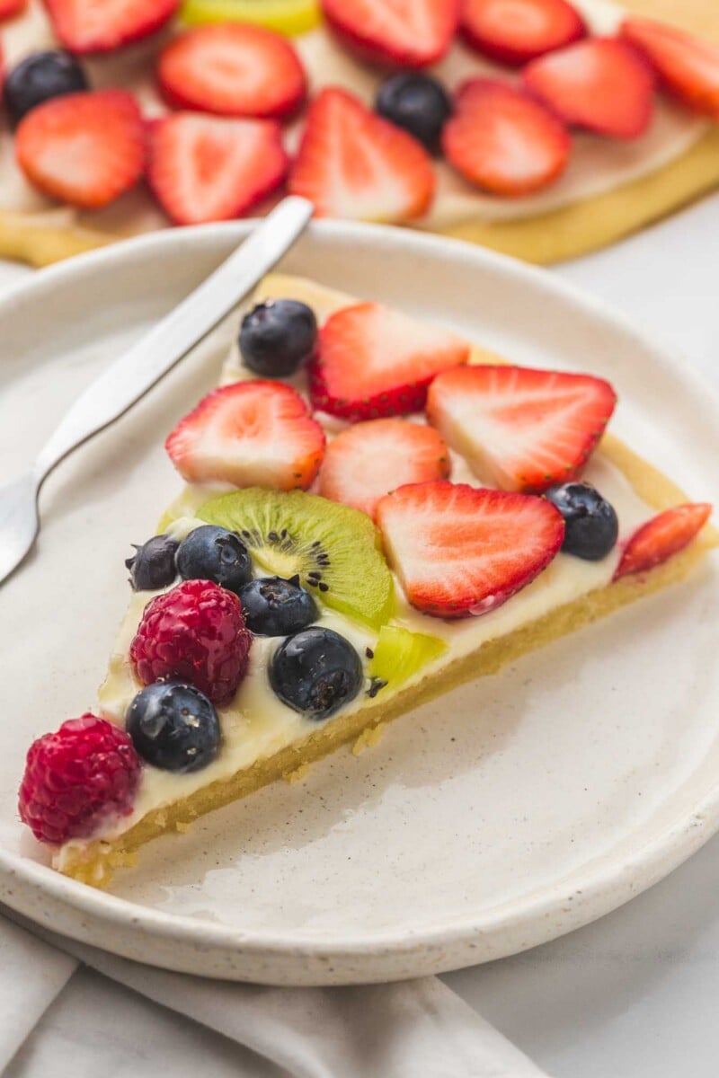 Easy Fruit Pizza (With Sugar Cookie Base and Cream Cheese Frosting!)