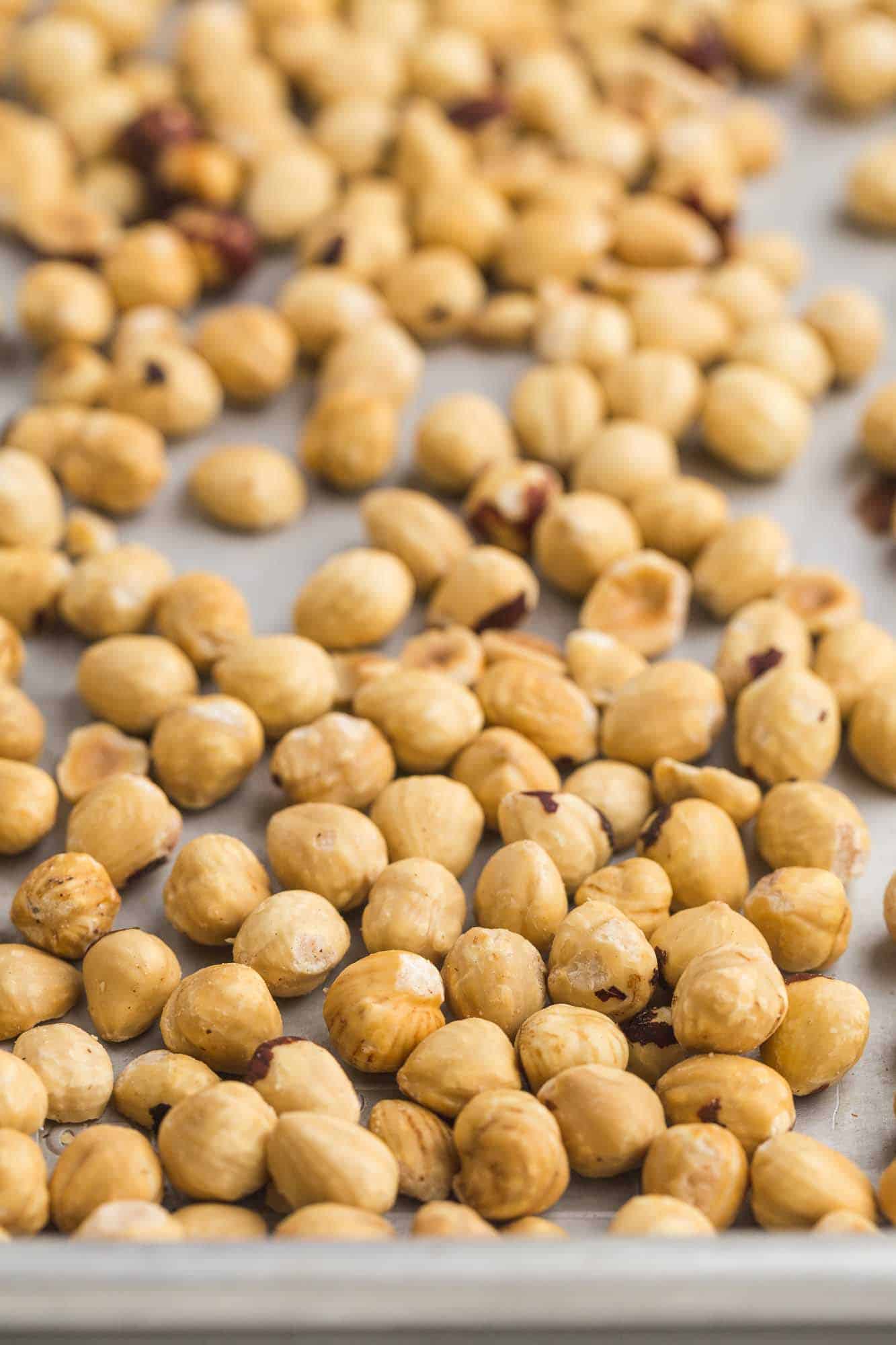 Roasted hazelnuts on a sheet pan