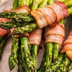 Bacon Wrapped Asparagus stacked on a plate