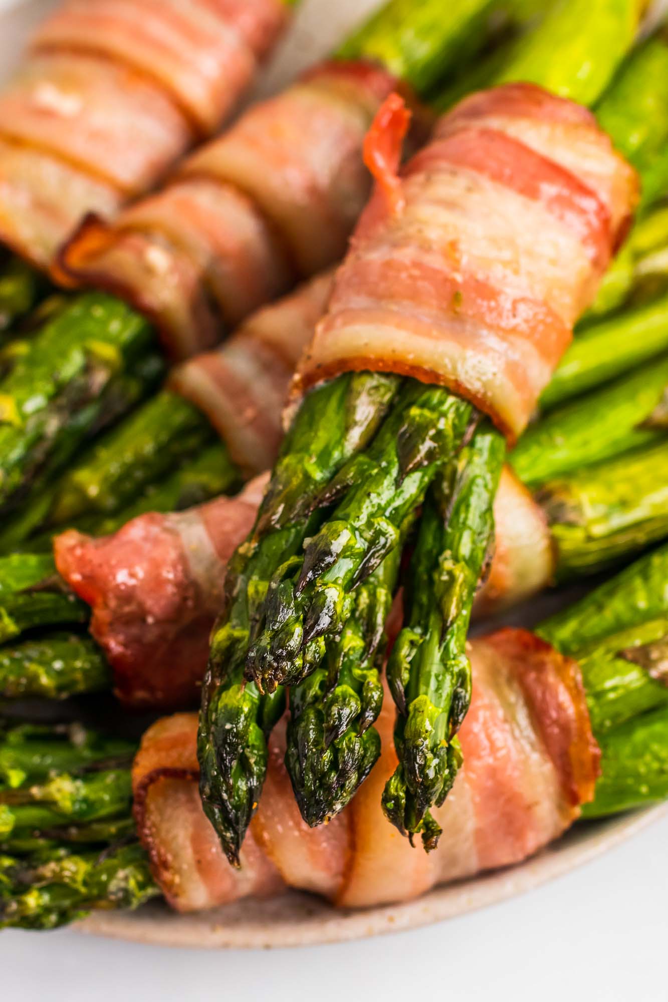 Stacked Bacon Wrapped Asparagus on a plate