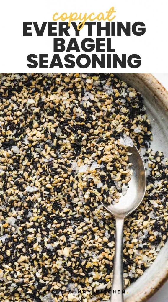 Everything bagel seasoning on a small plate with a spoon, and overlay text "copycat everything bagel seasoning"