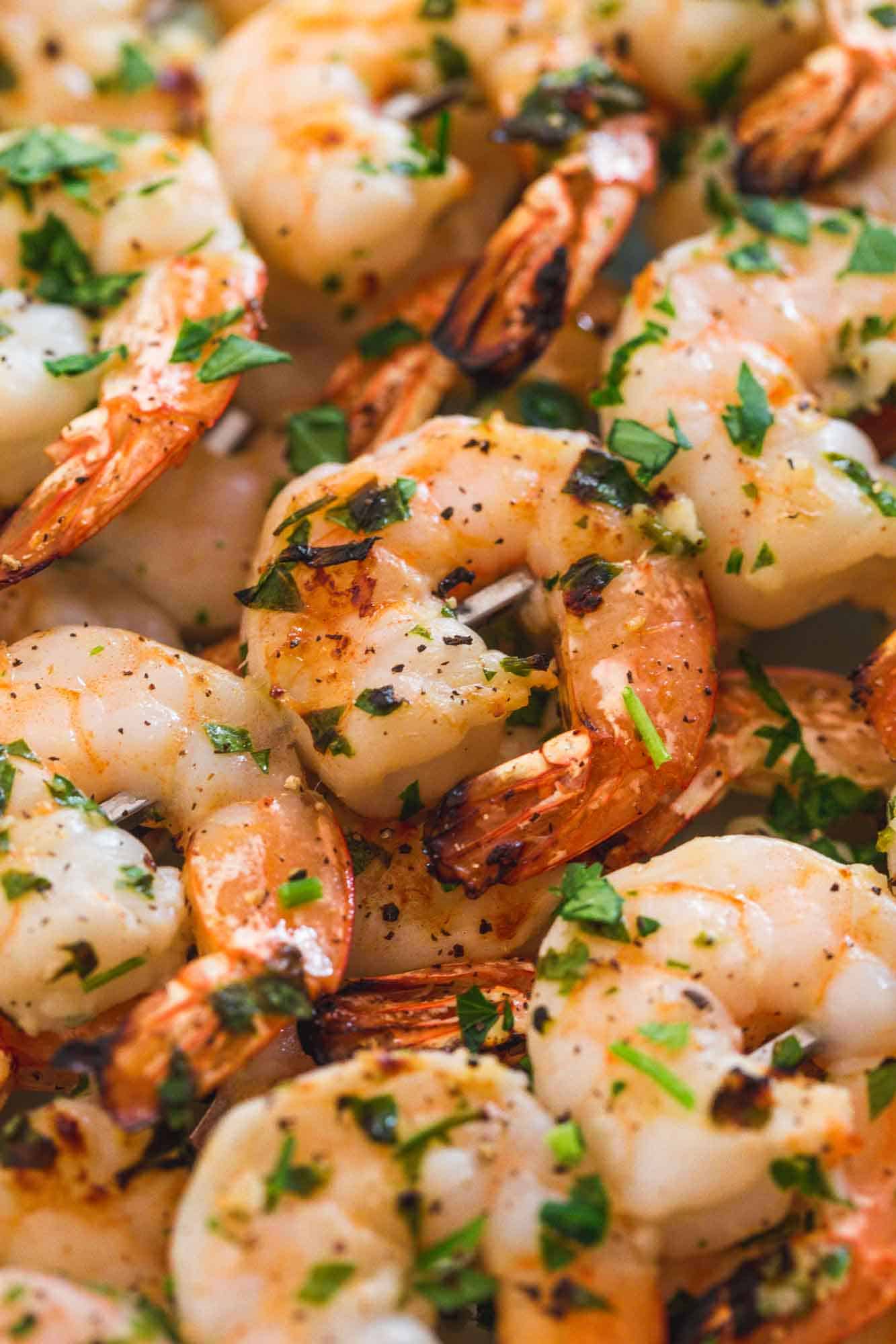 Close up shot of grilled garlic shrimp skewers