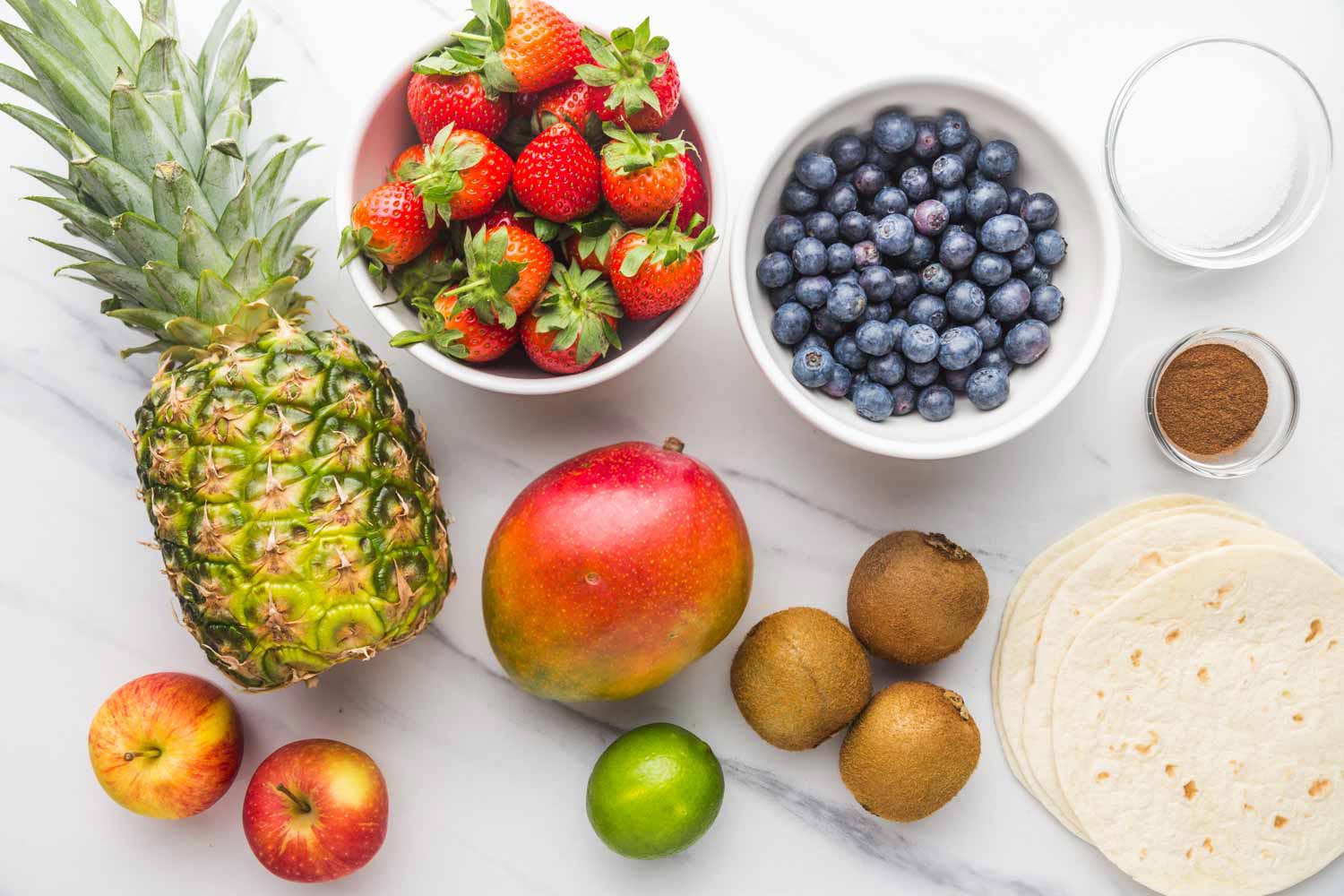 Ingredients for making fruit salsa and cinnamon chips