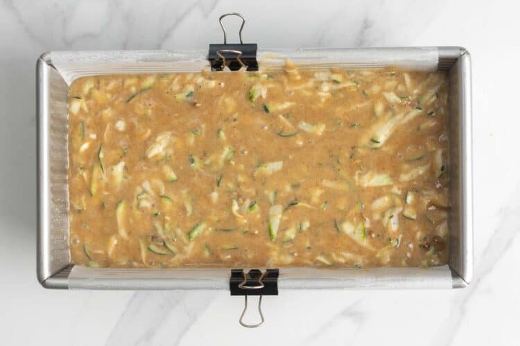 zucchini bread mixture in a loaf pan before baking