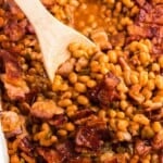 Baked beans and a wooden spoon