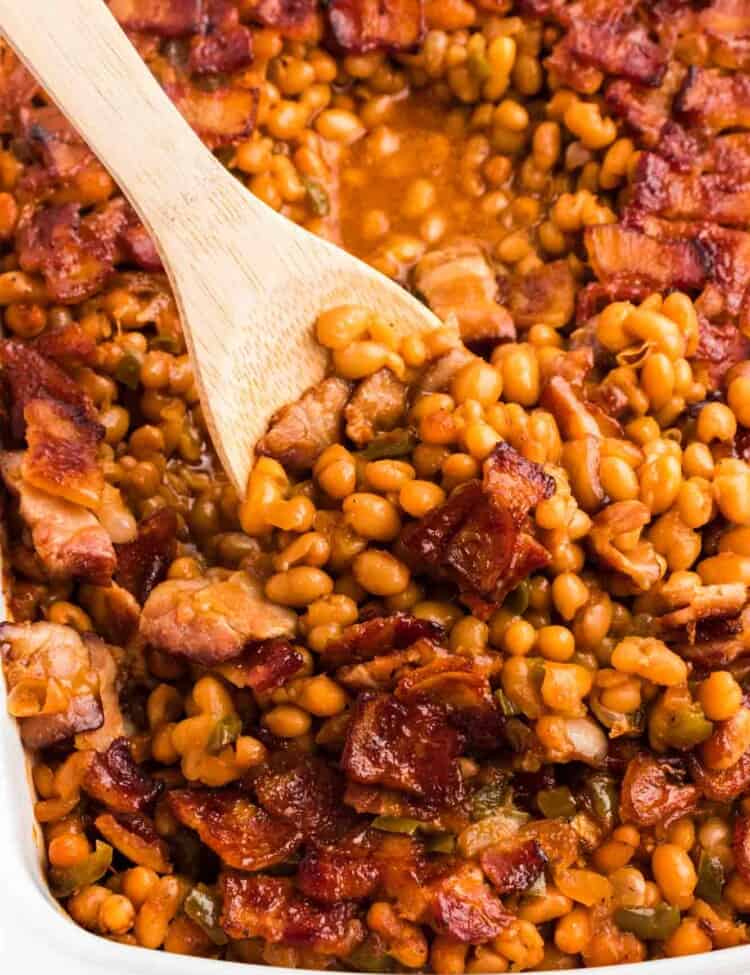 Baked beans and a wooden spoon