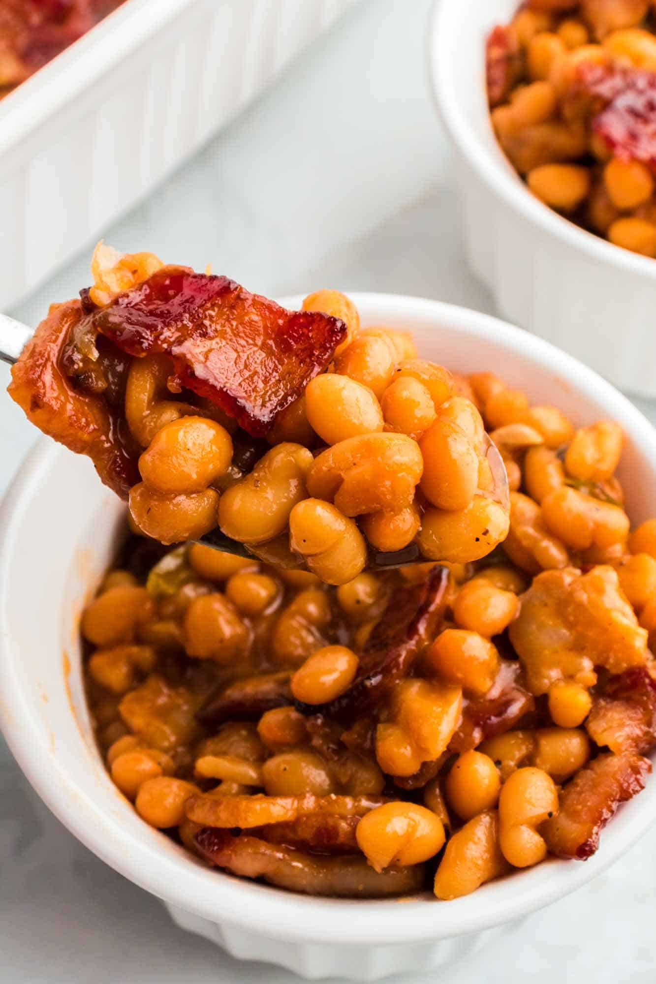 Baked beans with bacon served in a bowl