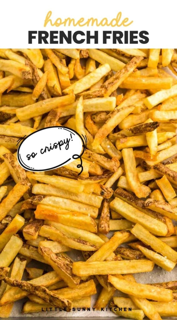 Crispy french fries on a sheet pan, and overlay text that reads "homemade french fries, so crispy!"