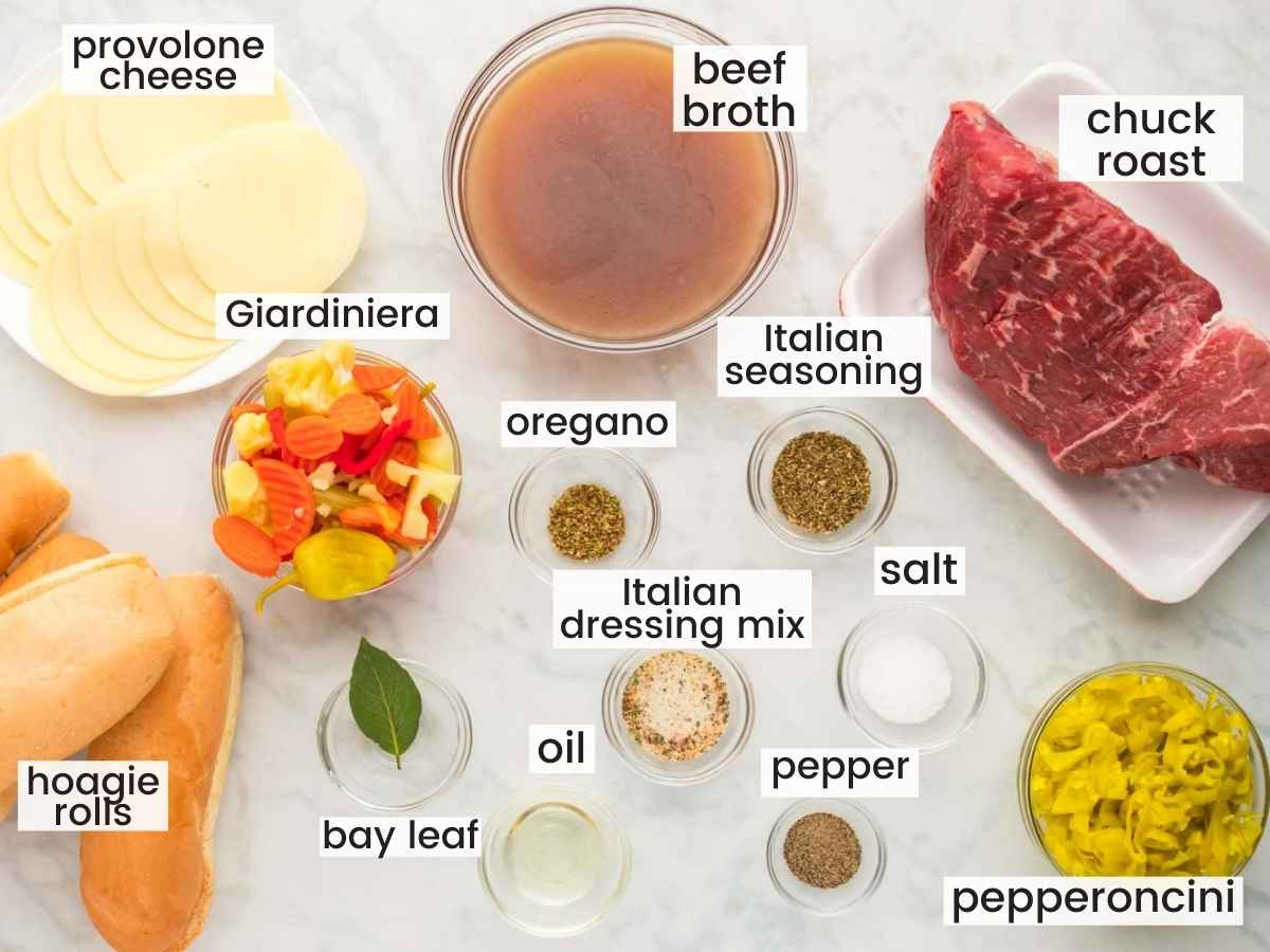 Italian Beef Sandwiches Ingredients including beef, italian seasonings, broth, giardiniera, pepperoncini, hoagie rolls, cheese.
