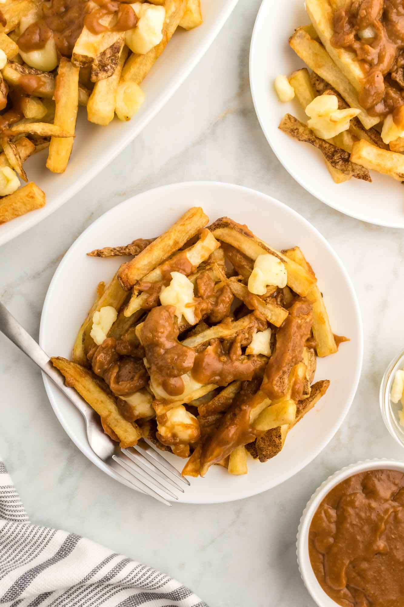Poutine plated in single servings