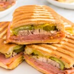 Cuban sandwiches served on a white plate