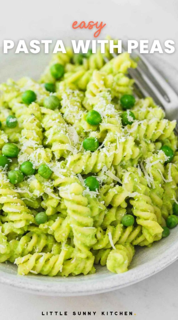 Green pasta with peas in a bowl