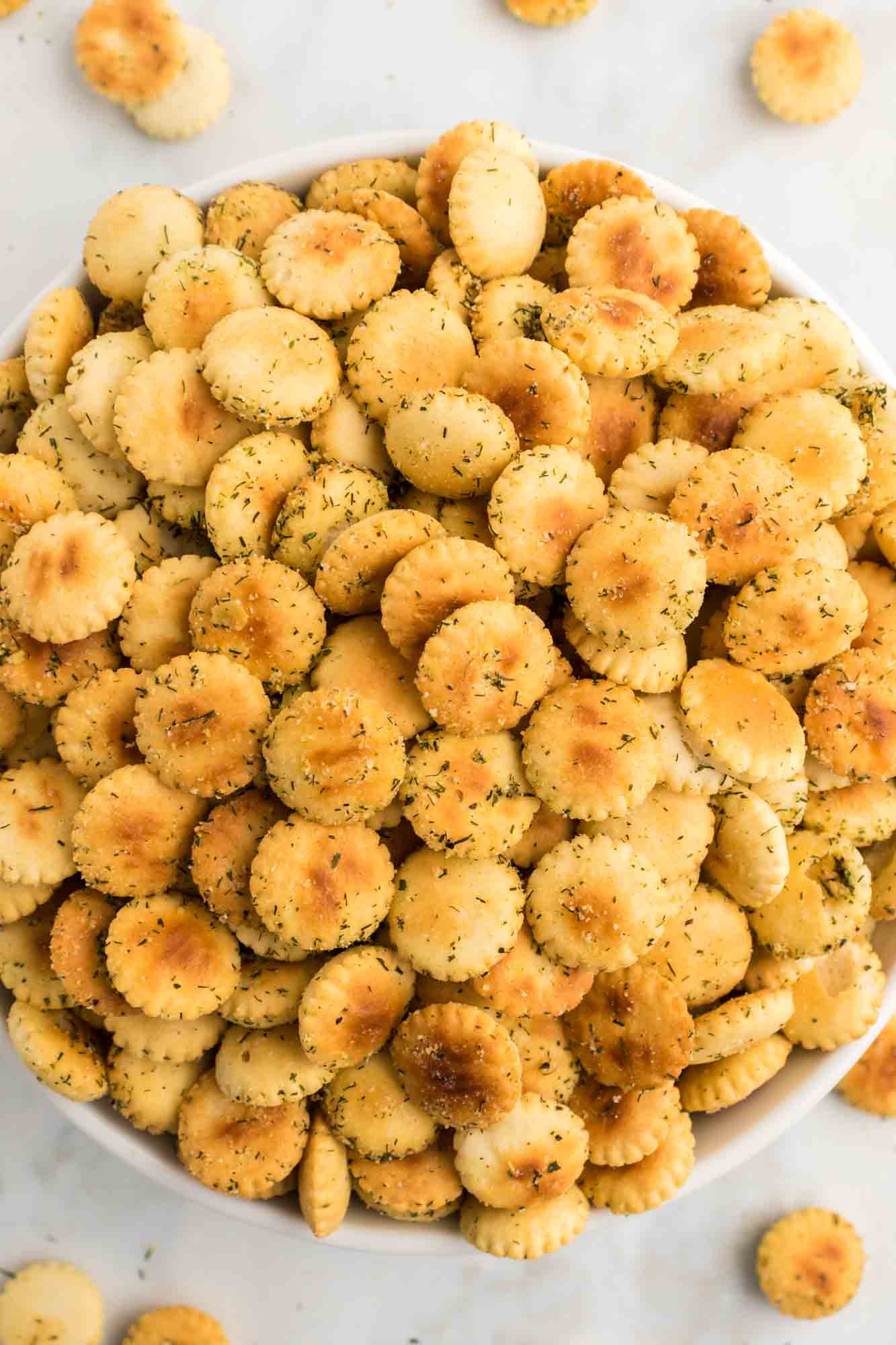 Overhead shot of ranch oyster crackers served in a large white bowl