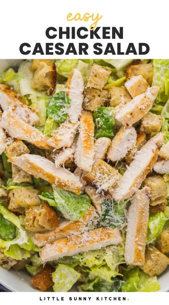 Overhead shot of Chicken caesar salad served in a large salad bowl and overlay text that says "easy chicken caesar salad"