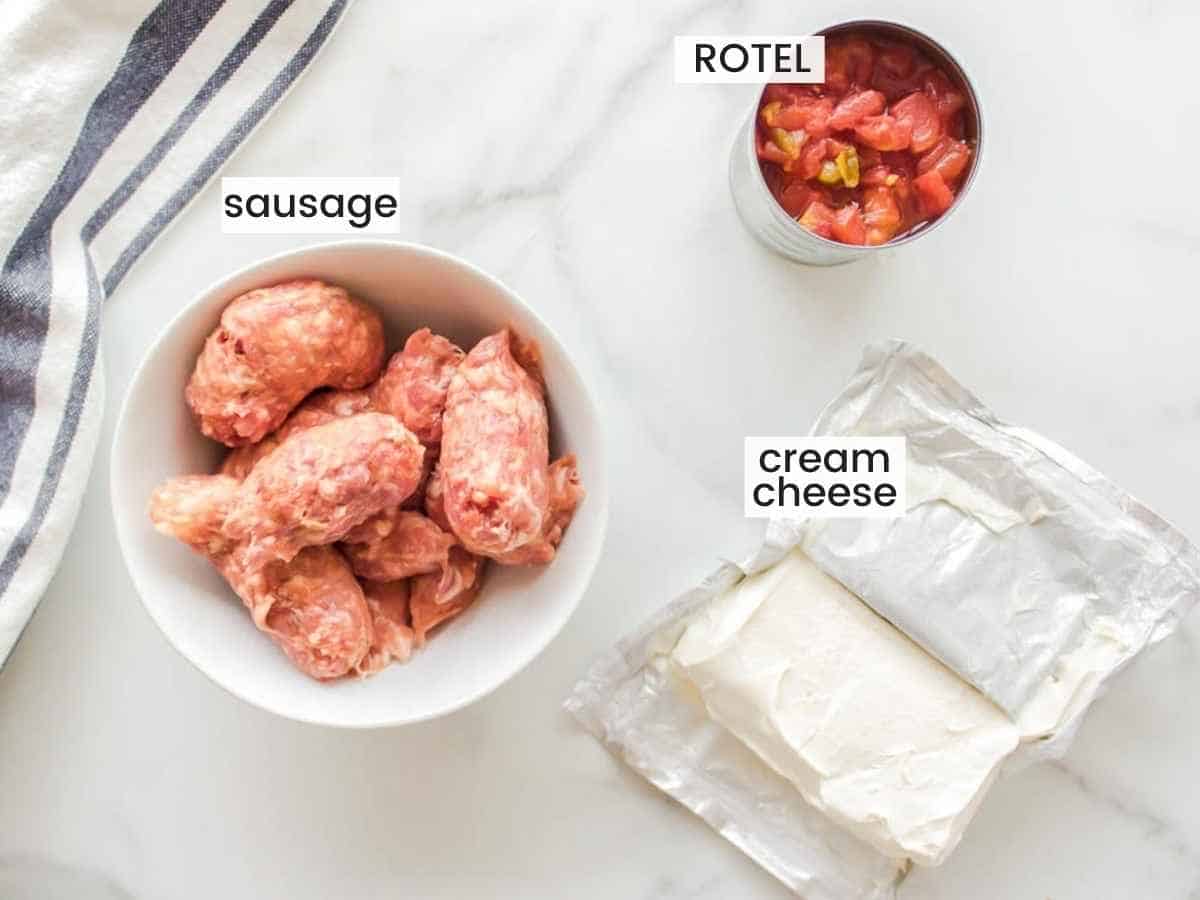 Ingredients needed to make sausage dip, including sausage meat without the casings, cream cheese, and a can of Rotel.