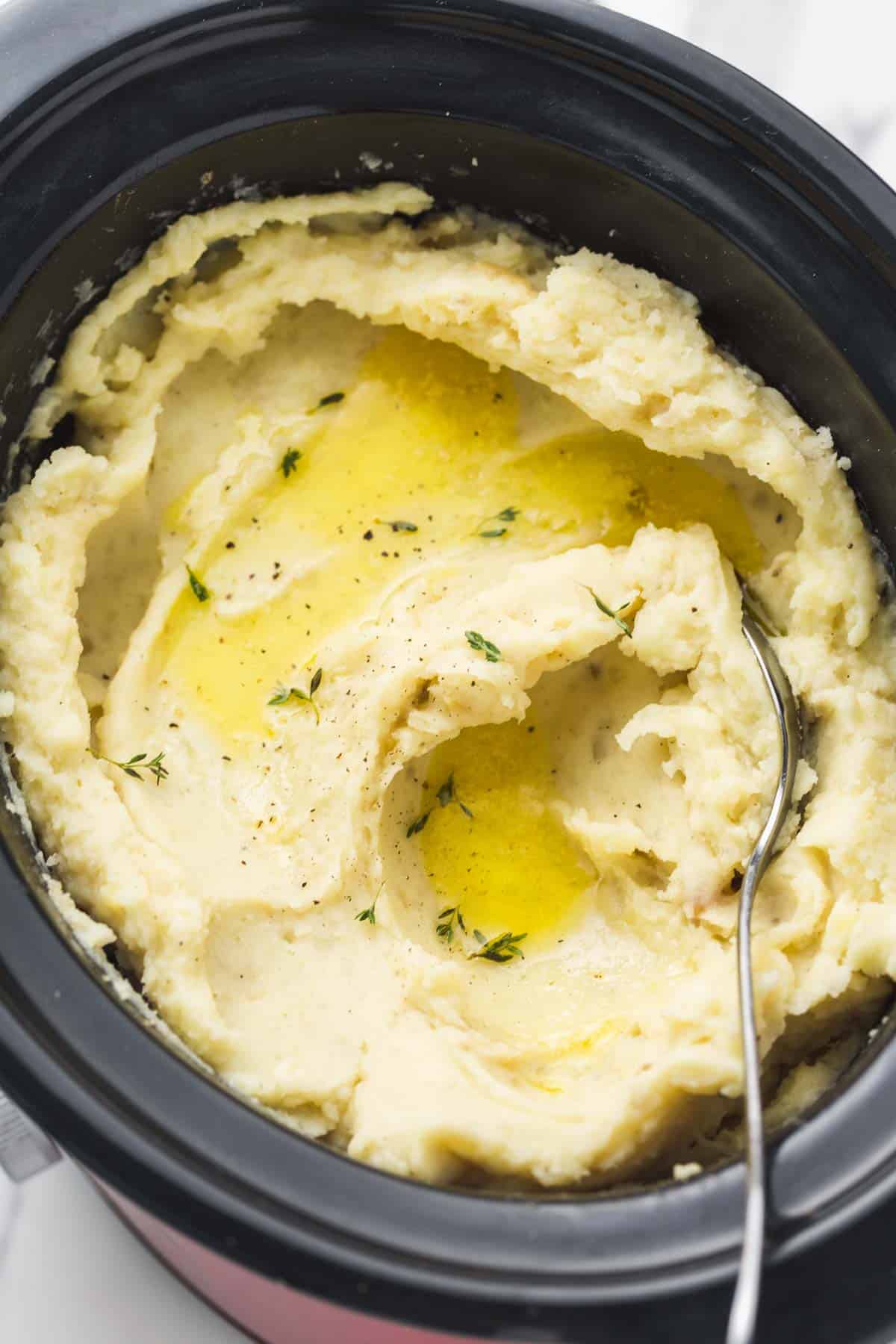 Creamy mashed potatoes served in the slow cooker