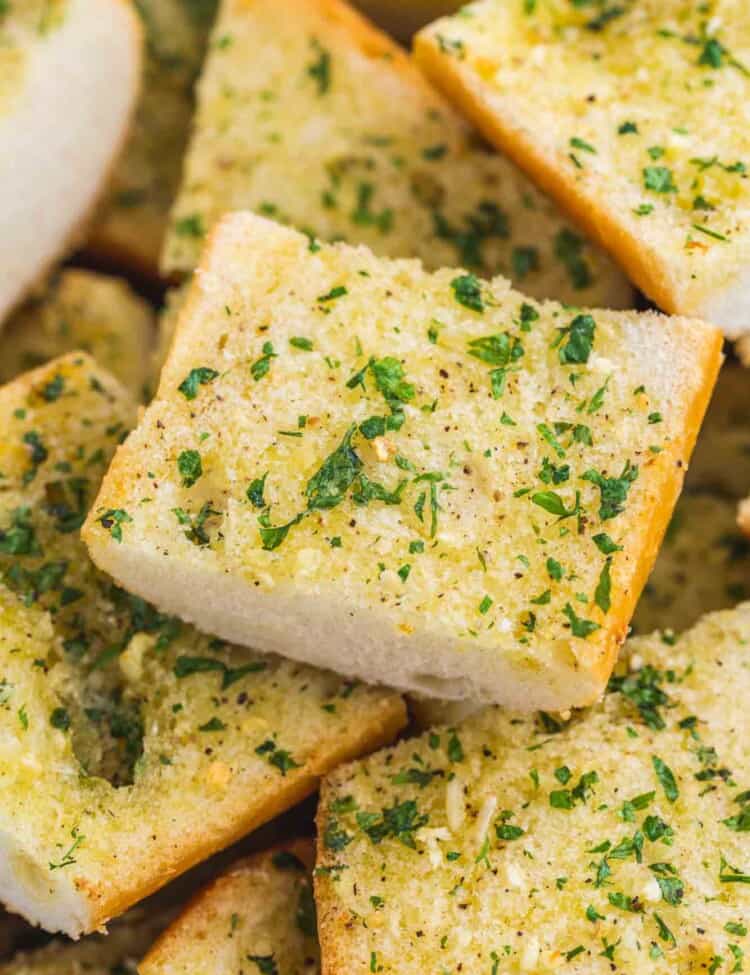 Close up shot of slices of toasted garlic bread
