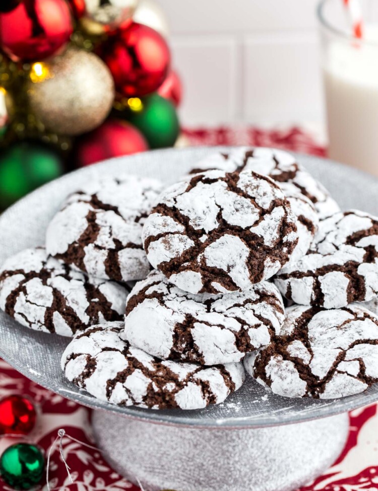 Chocolate crinkle cookies served on a small silver cake stand
