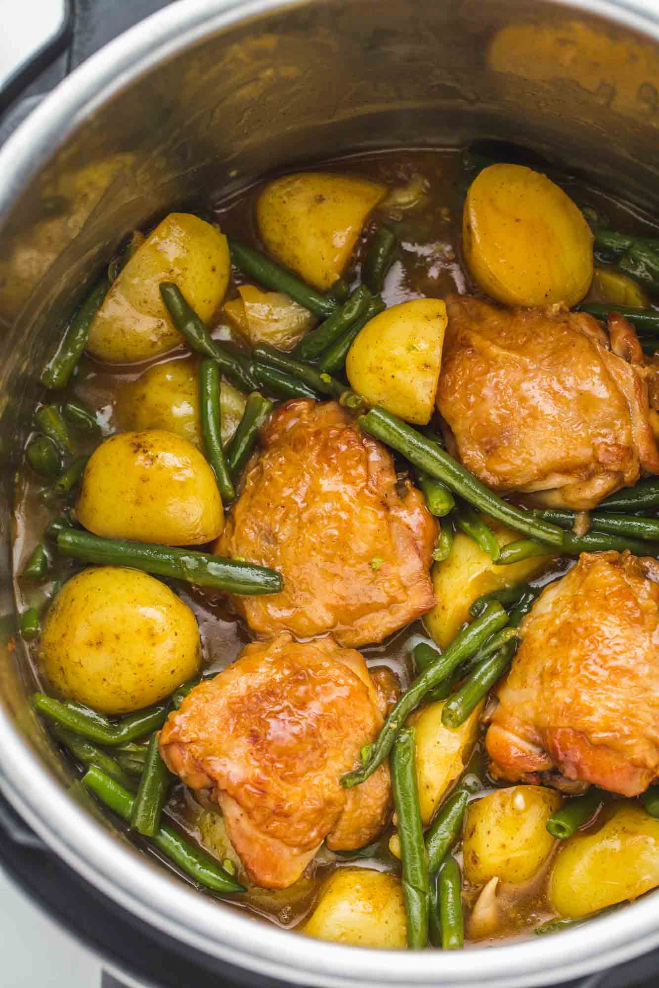 Honey garlic chicken thighs in the instant pot with green beans and baby potatoes