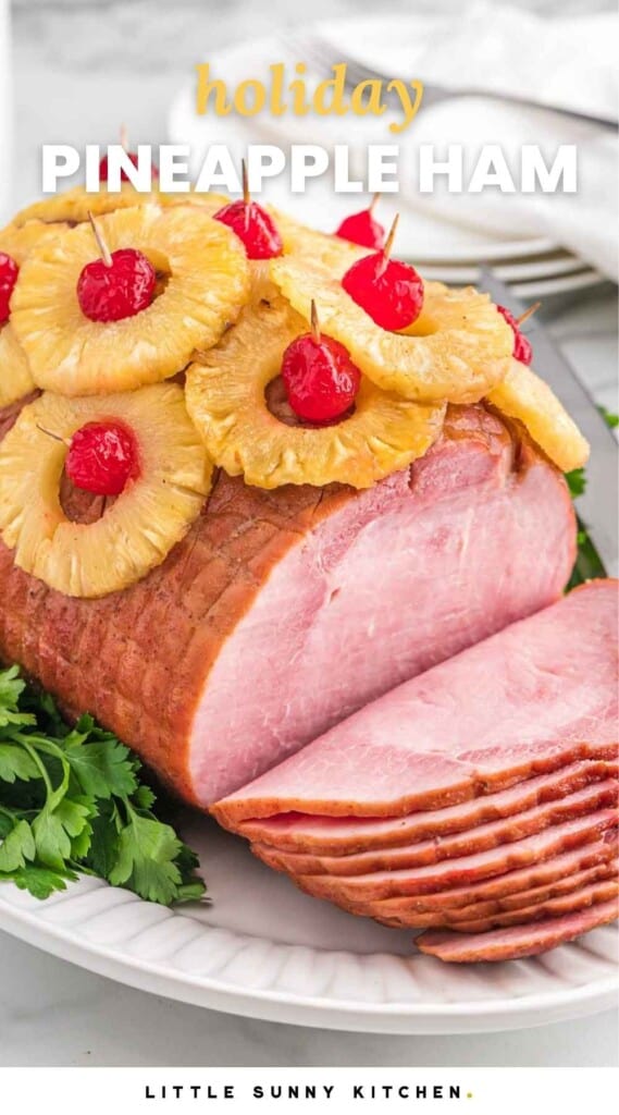 Pineapple ham, sliced, served on a white platter. And overlay text that says "holiday pineapple ham"